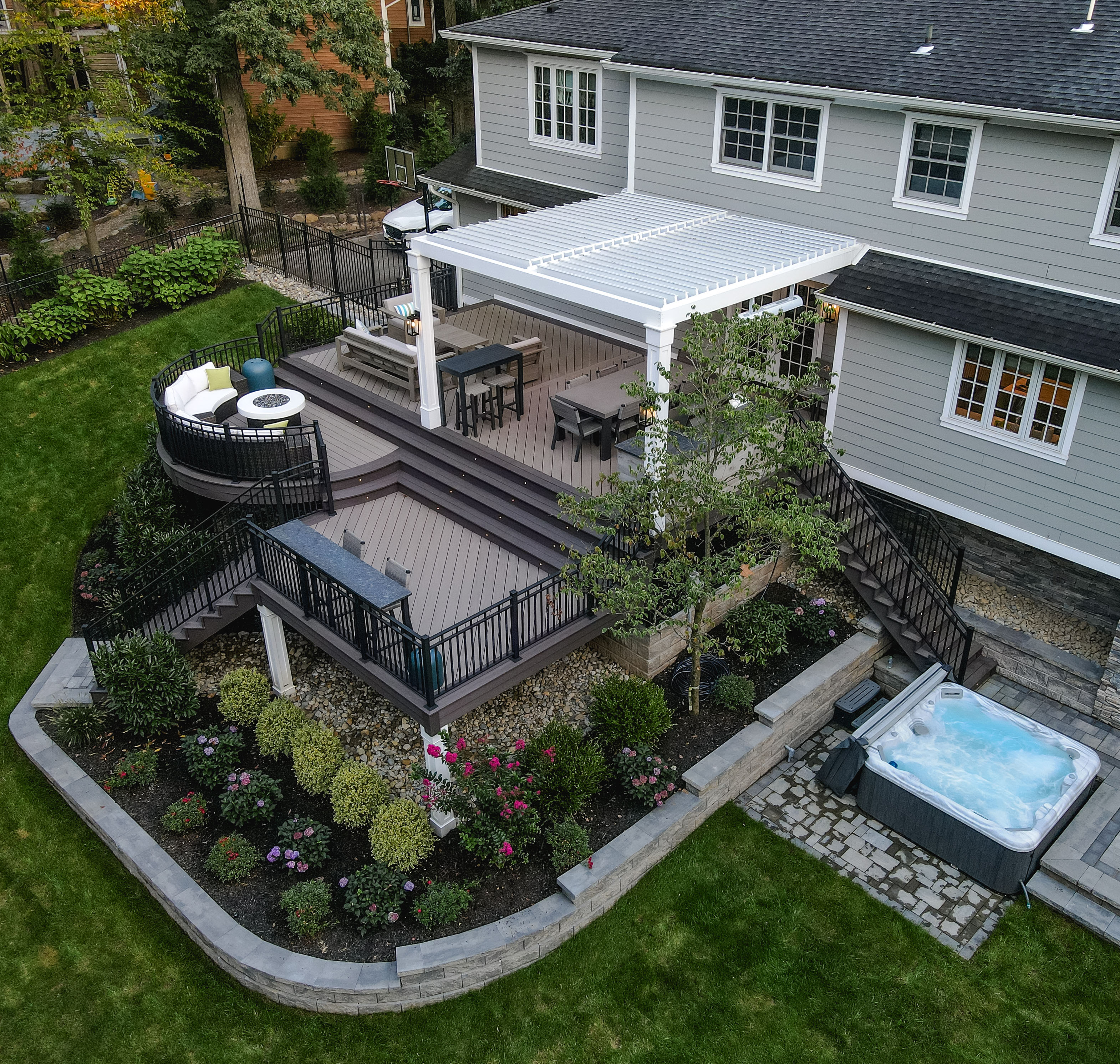 Defining Spaces with Elevation: The Beauty of Multi-Level Decks